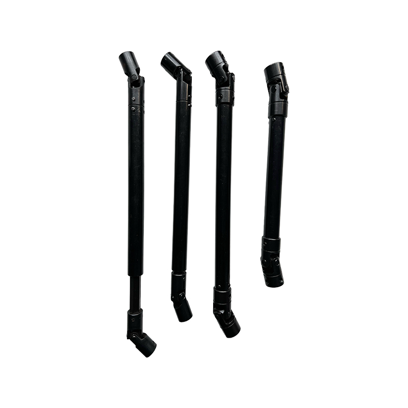 How do high-strength alloy steel and surface hardening improve the fatigue and wear resistance of universal joint shafts and bearings?